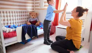 a woman taking care of a child with autism